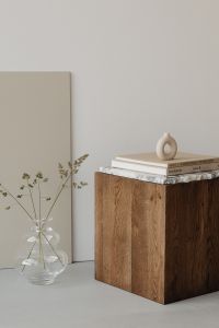 Kaboompics - Glass vase -side table - cubicle - walnut wood - pedestal - upholstered armchair