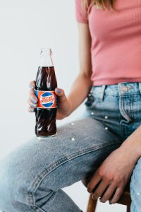 Kaboompics - Young woman with Pepsi Cola bottle