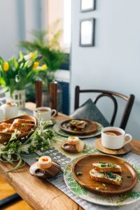 Kaboompics - Breakfast served with tea, bread and eggs