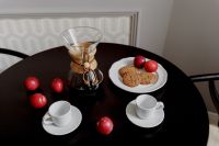 Kaboompics - Breakfast served with coffee, cookies and plums