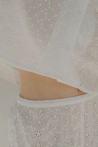 Kaboompics - Woman in white cotton pajamas - belly - navel