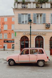 Pink Renault 4 on the street in the city of Rovinj, Croatia