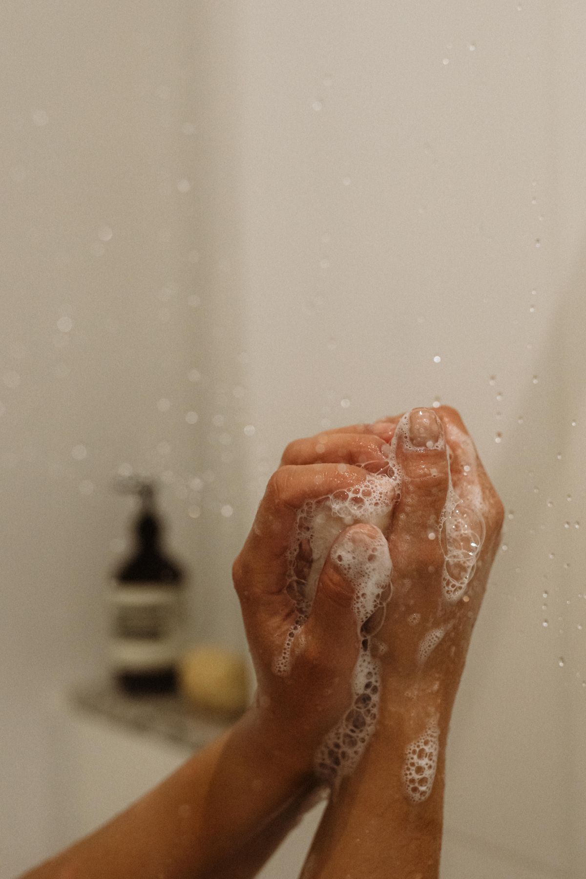 Relaxing shower ritual with hair care, skincare, and self-care products