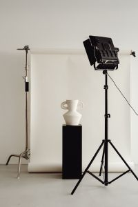 Photo studio interior - C-stand lighting tripod - photo backdrop - LED lamp