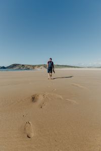 Footprints on a sandy beach, Portugal