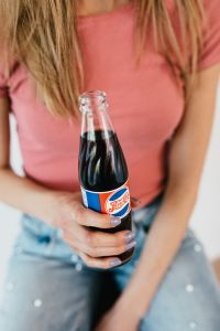 Kaboompics - Young woman with Pepsi Cola bottle