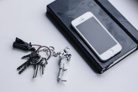 Kaboompics - iPhone, Moleskin notebook, keys, Stormtrooper