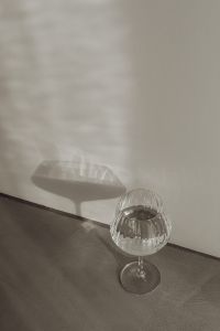Water in wine glass - shadows - backgrounds