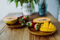 Kaboompics - Exotic fruits on a wooden table