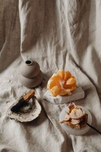 Kaboompics - Linen fabric - mandarine - dried rose - palo santo