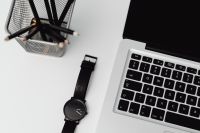 Kaboompics - Black watch and Macbook laptop - pencils