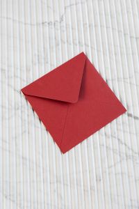 Kaboompics - Red envelope on marble