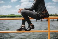 Kaboompics - Beautiful blonde woman on a wooden pier by the lake