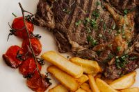 Classic Steak with Golden Fries and Rich Gravy - Dip - Grilled Tomatoes