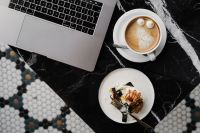 Kaboompics - Coffee and Cake with Laptop on Marble Table – Cozy Workspace Background