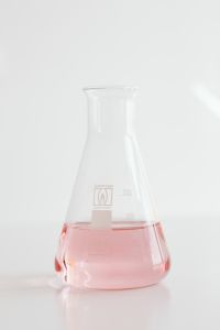 Conical flask with pink liquid