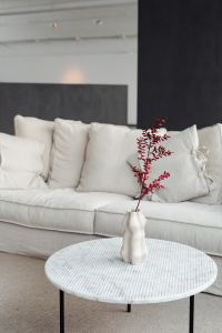 Marble round table - linen sofa - beige - living room - vase
