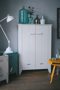 White and cyan home decor with a white wardrobe