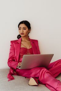 Kaboompics - Elegant Asian Businesswoman in Satin Suit Focused on Laptop Work\ ![Elegant Asian Businesswoman in Satin Suit Focused on Laptop Work