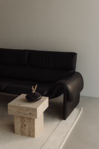 Kaboompics - Interior Inspo: Warm Minimalist Living Room - de Sede DS-2011 Leather Sofa and Travertine Furniture