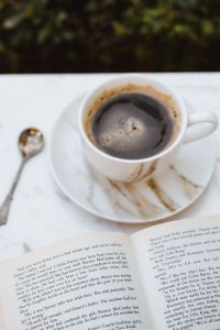 Cup of Coffee and an Open Book