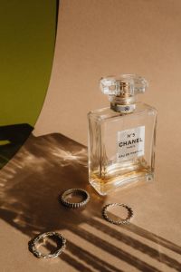 Refined Aromas: Perfume Bottles Cast in Shadows and Light