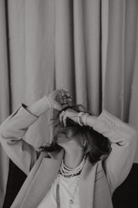 Kaboompics - Black-and-White Fashion Portrait with Layered Pearl Necklaces