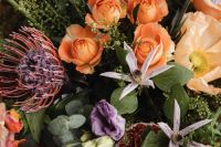 Kaboompics - Florist Floral Design Detail With Protea-Like Bloom and Roses