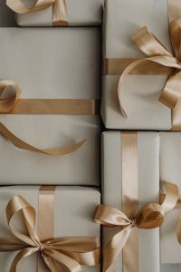 Kaboompics - White Gift Boxes with Champagne Ribbon Bows