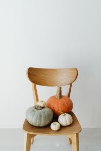 Kaboompics - Autumn Pumpkins on a Mid Century Wooden Chair