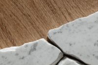 Kaboompics - Broken White Marble Slabs on an Oak Surface in Close-Up