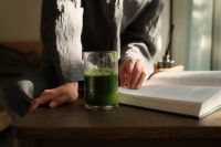 Kaboompics - Overhead View of an Open Book and Green Smoothie