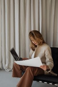 Kaboompics - Cropped Portrait of Woman Focused on Her Laptop