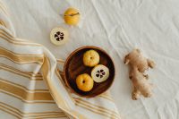 Kaboompics - Japanese Quince Bowl with Ginger Root and Seeded Cut Fruit, Rustic Linen Food Styling