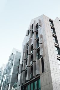 Kaboompics - Gdańsk Modern Office Tower with Textured White Facade and Geometric Window Panels