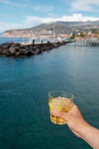 Kaboompics - Soft-Focus Harbor Pier with a Drink in the Foreground