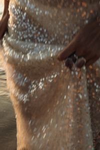 Kaboompics - Motion Blur Sequin Dress and Statement Ring Detail