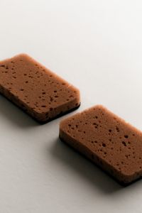 Kaboompics - Brown Cleaning Sponges on White Background