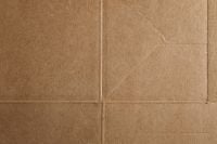 Kaboompics - Brown Cardboard Background with Intersecting Panel Seams