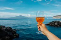 Kaboompics - Aperol Spritz and Mediterranean Coast beneath Open Sky