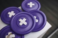 Kaboompics - Ultra Violet Discs with White Plus and Cross Symbols