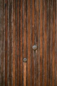 Kaboompics - Vintage Wooden Door Detail with Round Brass Knob