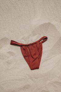 Kaboompics - Red Bikini Bottom on the Sand