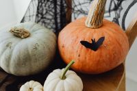 Kaboompics - Halloween Pumpkins and Spiderweb Chair Decor