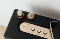 Kaboompics - Black speaker on marble table, white wall, mobile phone, cacstus