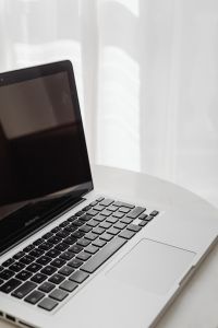 Kaboompics - Close-Up Open Laptop by Sheer Curtains, Bright Minimal Home Office Background