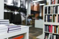 Kaboompics - Books lying on the shelves