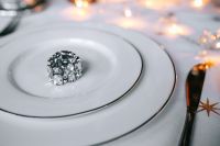 Kaboompics - Silver Faceted Ornament on White Plate with Copy Space