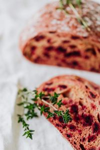 Kaboompics - Close-Up of Beetroot Bread Slice with Thyme