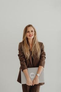 Kaboompics - Professional Portrait of Female Interior Stylist Holding Laptop